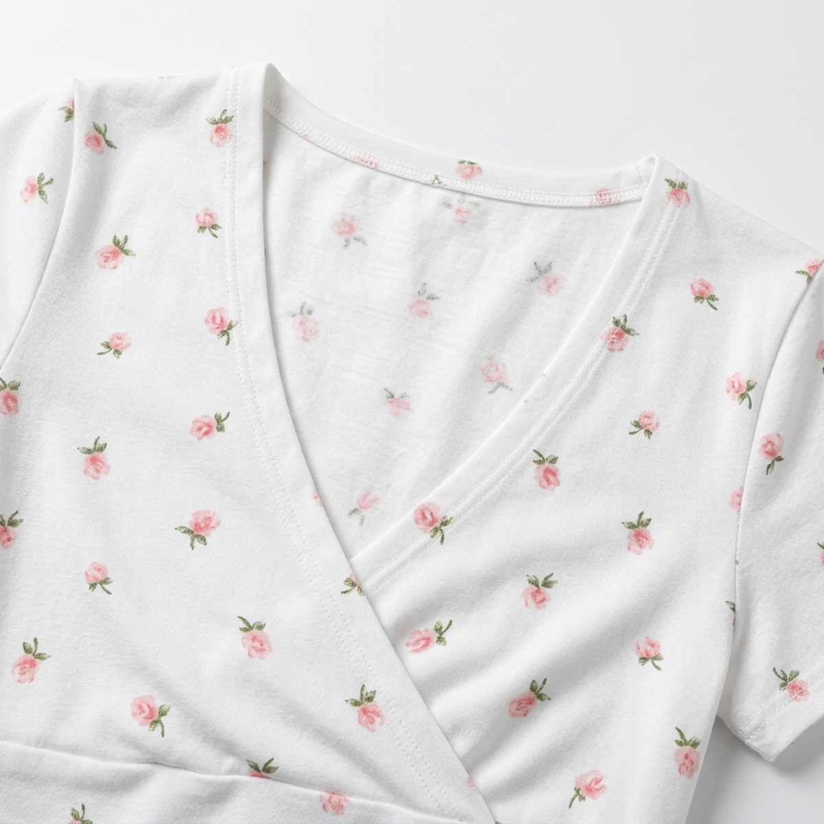 Wrap style crop top for women featuring v-neck and fitted silhouette