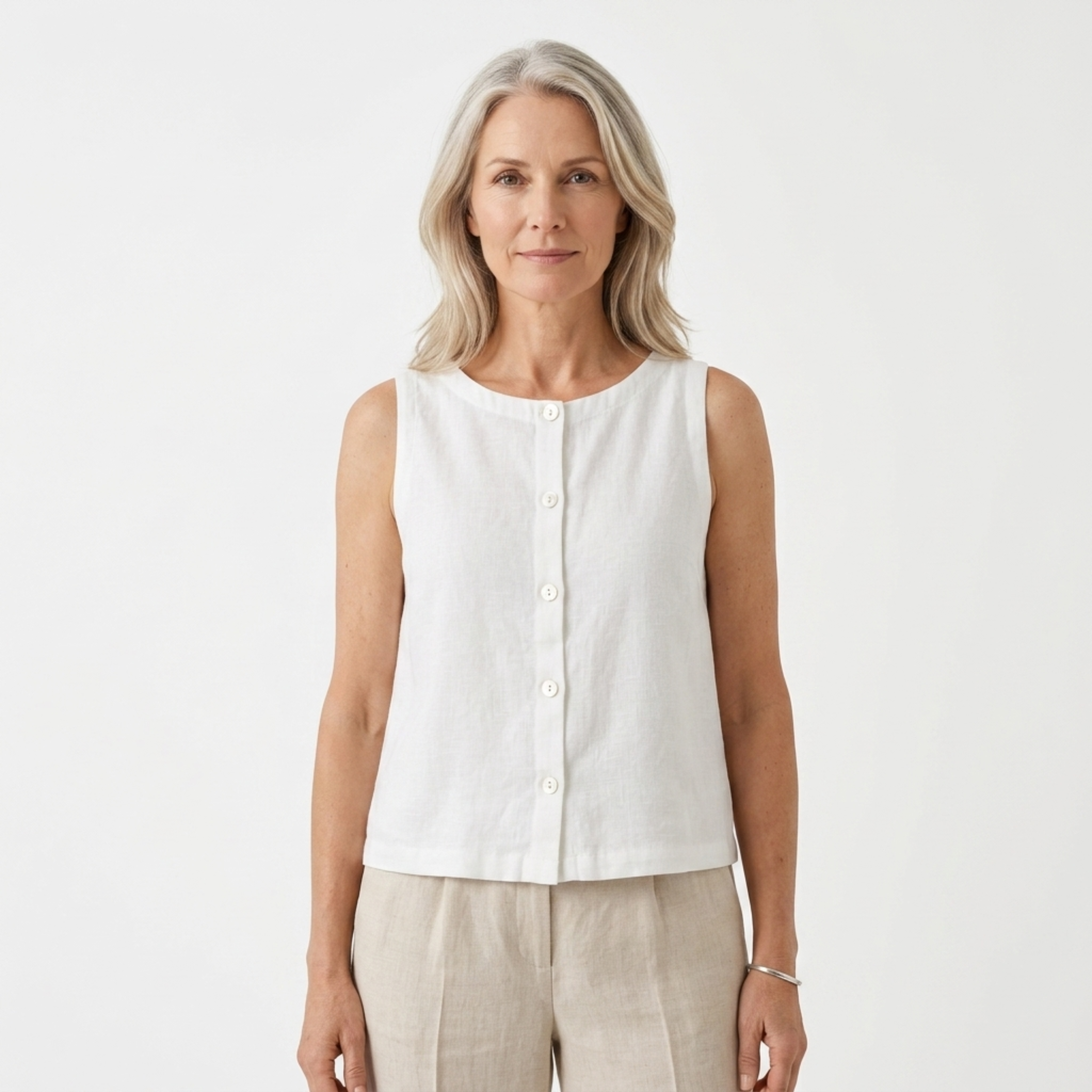 Women's crop top in pure linen with asymmetric hem — summer vacation